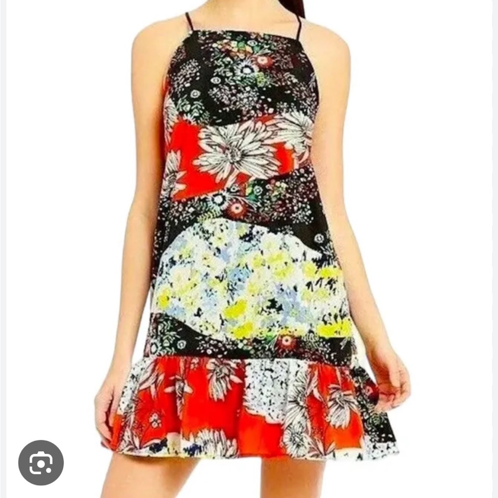 Nicole Miller ruffle flounce hem black floral dress. Size 4.